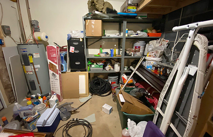 Garage tool and toy storage area (before)