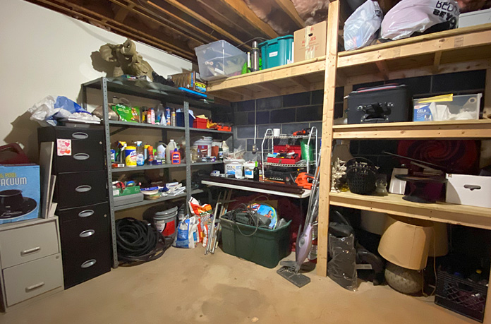 Garage tool and toy storage area (before)