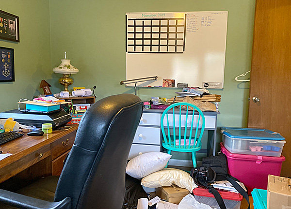 Garage tool and toy storage area (before)